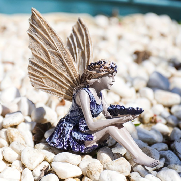 Sunflower Fairy Resin Sculpture: Lifelike Outdoor Decor for Fairy Gardens and Lawns.