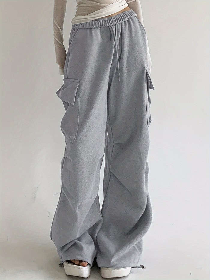 Flap Pockets Drawstring Loose Pants, Casual Solid Color Pants For Spring & Fall, Women's Clothing