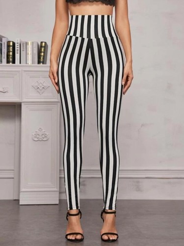 High-Waisted Striped Yoga Leggings - Stretchy, Sweat-Wicking, Four-Way Stretch, Tight Fitting, Vertical Black and White Striped, Perfect for Exercise, Fitness, and Everyday Wear