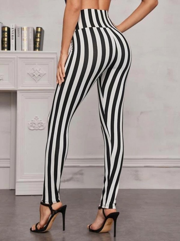 High-Waisted Striped Yoga Leggings - Stretchy, Sweat-Wicking, Four-Way Stretch, Tight Fitting, Vertical Black and White Striped, Perfect for Exercise, Fitness, and Everyday Wear