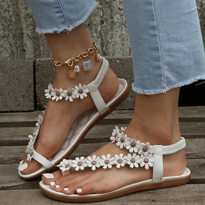 White Elegant Floral Flat Sandals - Women's Strappy Elastic Toe-Loop Slip-On Summer Shoes with Braided Straps and PU Cover Sole