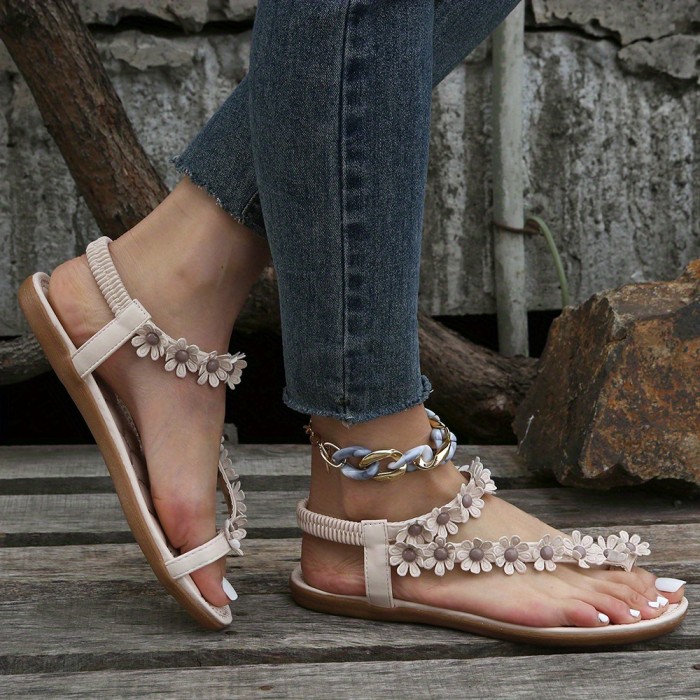 White Elegant Floral Flat Sandals - Women's Strappy Elastic Toe-Loop Slip-On Summer Shoes with Braided Straps and PU Cover Sole