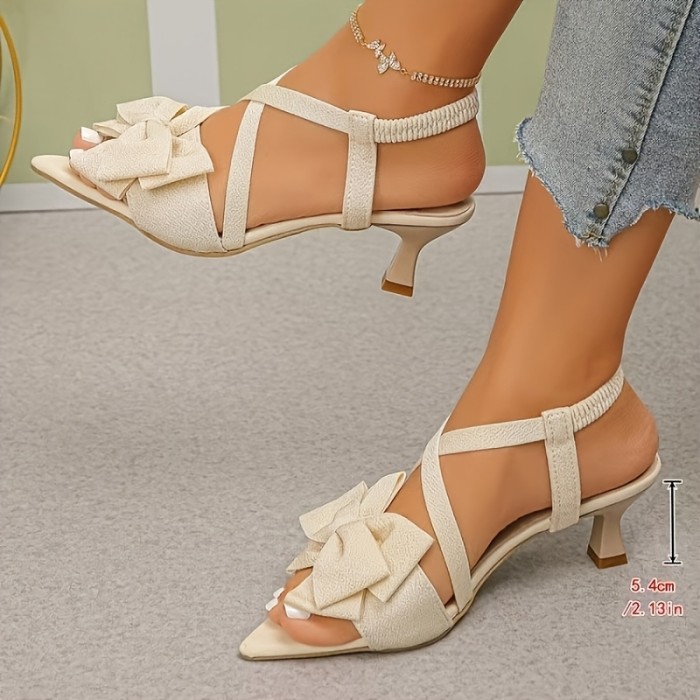 Summer Stiletto Open-Toe Pointed Sandals with a Cross Strap Design And Bow, Creating a Slim And Tall Appearance. They Have a Minimalist And High-End Feel, Making Them Versatile for Any Outfit, Suitable for Dates, Parties, Commuting, And Shopping.