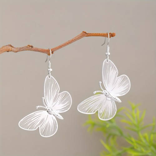 A Pair of Hollow Double-Layer Butterfly Earrings, Featuring a Stylish And Minimalist Design, Perfect for Vacation Additions, And Unique Jewelry for Women