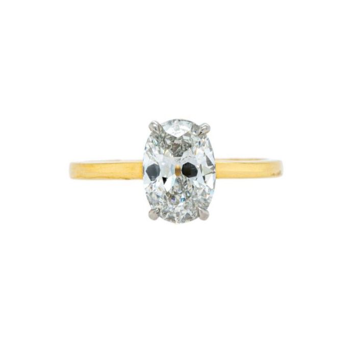 Golden Oval Cut Engagement Ring