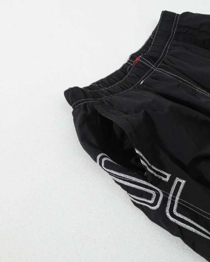 Supreme 25 SPELLOUT EMBROIDERED TRACK PANT FZKZ1723