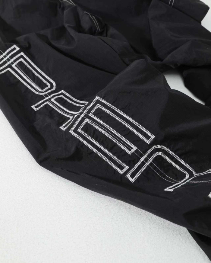 Supreme 25 SPELLOUT EMBROIDERED TRACK PANT FZKZ1723