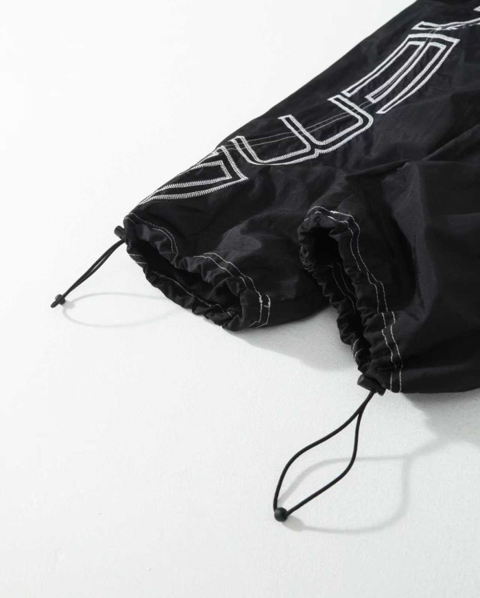 Supreme 25 SPELLOUT EMBROIDERED TRACK PANT FZKZ1723