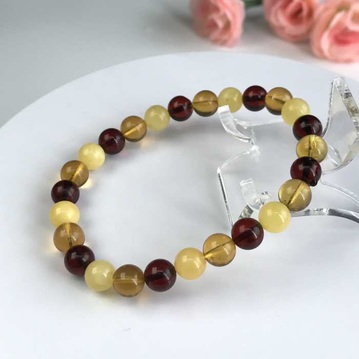 Amber hand string