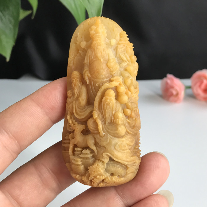 Yellow jade God of wealth (unpolished)