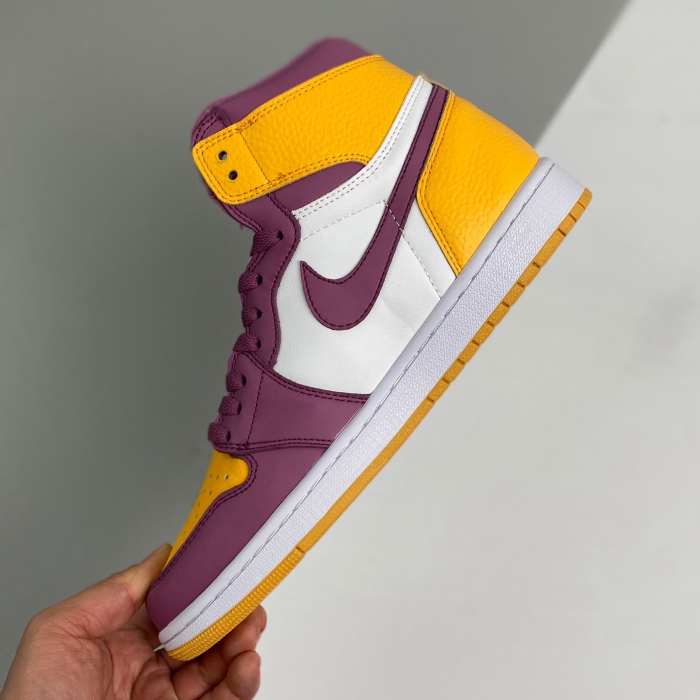 yellow and purple jordan 11