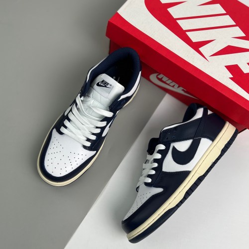 adult Dunk Low Valerian Blue and white