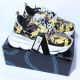 Versace adult Chain Reaction black yellow