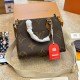 Women's original onthego Cowhide knurling handbag brown 25cm
