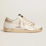 Super-Star sneakers with gold sparkle foxing and metal stud lettering