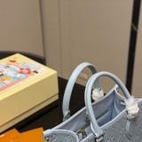 Original Onthego Monogram Empreinte Tote Bag Candy Blue M46840