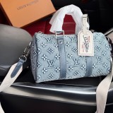 Original Keepall Bandoulière 25 Denim Blue Monogram Embossed Canvas Travel Bag