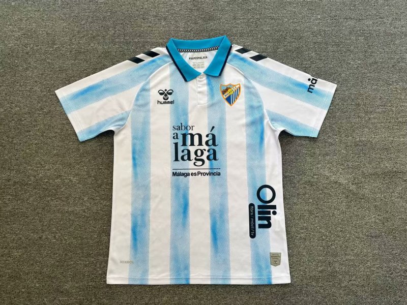 Malaga home 23-24