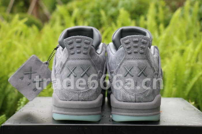 Authentic Kaws x Air Jordan 4 “Cool Grey”