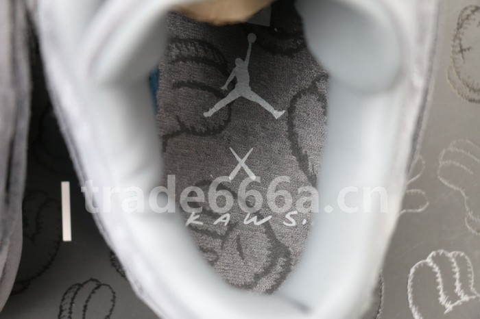Authentic Kaws x Air Jordan 4 “Cool Grey”