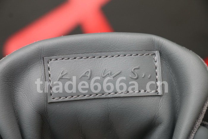 Authentic Kaws x Air Jordan 4 “Cool Grey”