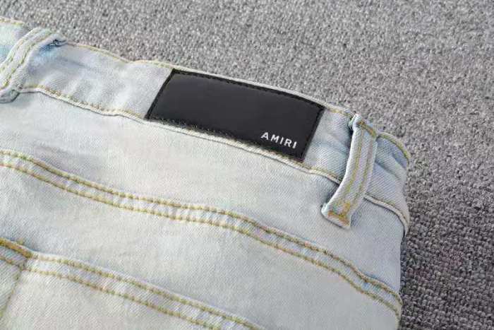 Amiri hole letters skinny jeans
