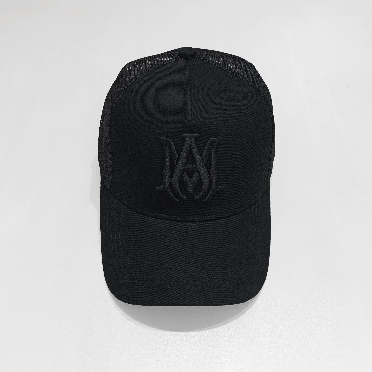 am embroidered lettered mesh hat-