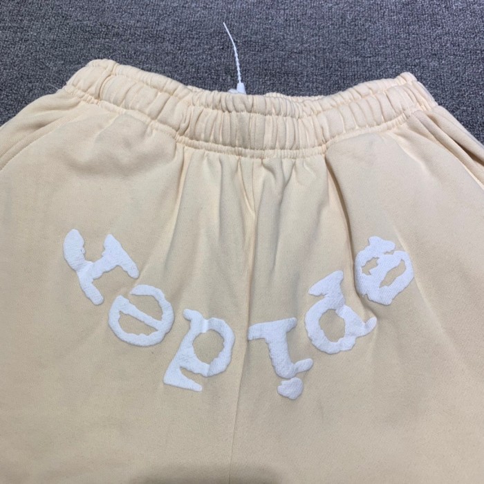 Young Thug Sp5der White lettering beige pants