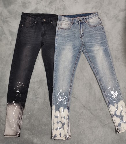 Slim jeans with paint and ink at the bottom