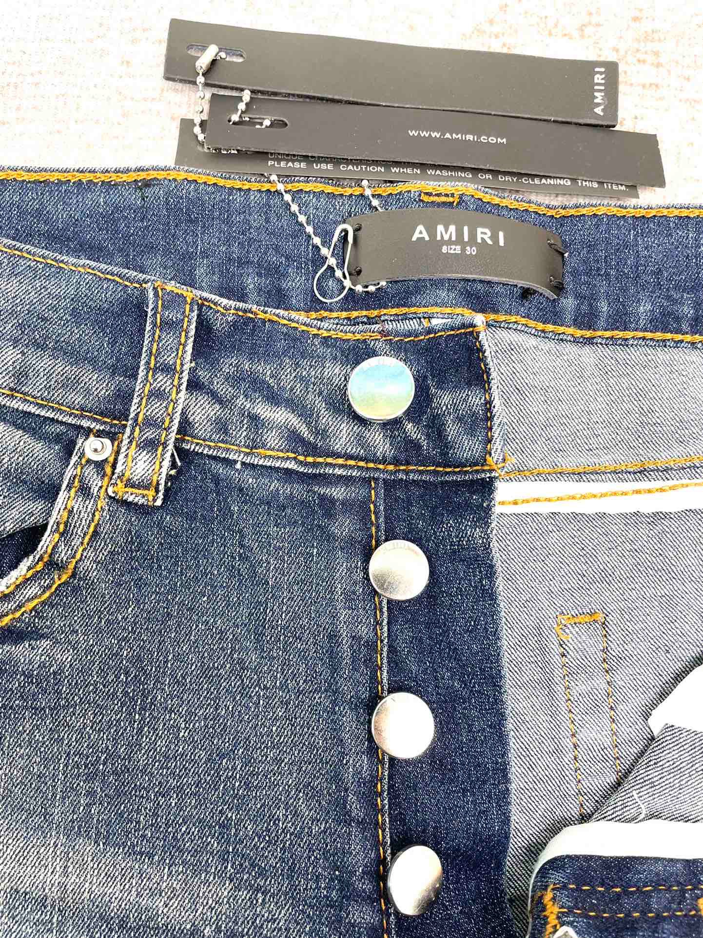 1:1 quality version multiple knife cut cashew flower patch slim jeans