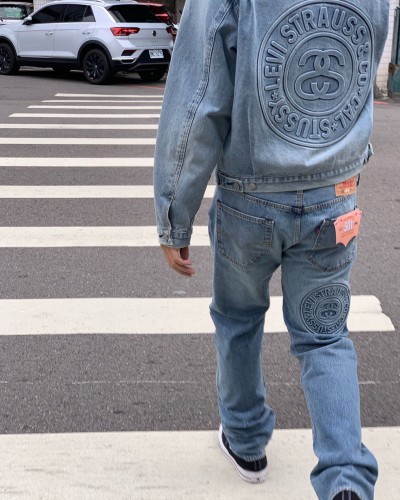 1:1 quality version150th anniversary embossed logo jeans