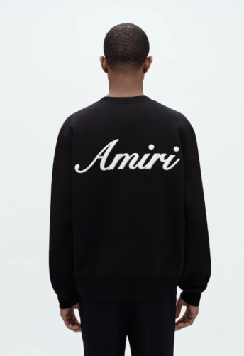 Hoodie with cursive letters on the back