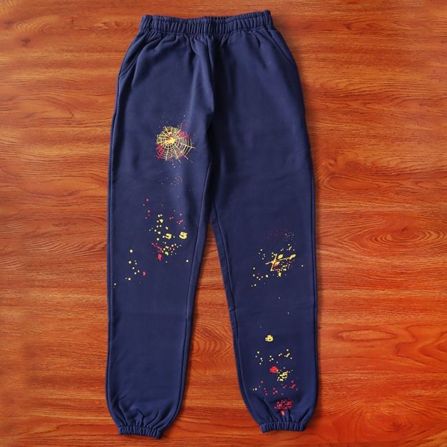 Yellow and pink spiderweb dot graffiti print sweatpants