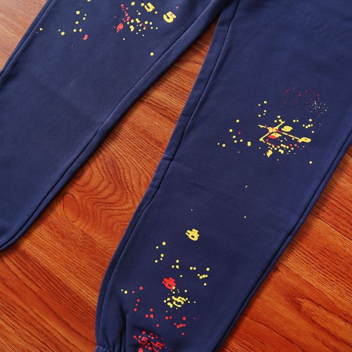 Yellow and pink spiderweb dot graffiti print sweatpants