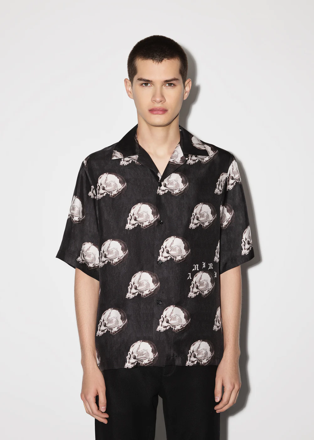 all-over print skull and crossbones small letter print shirt 2 colors