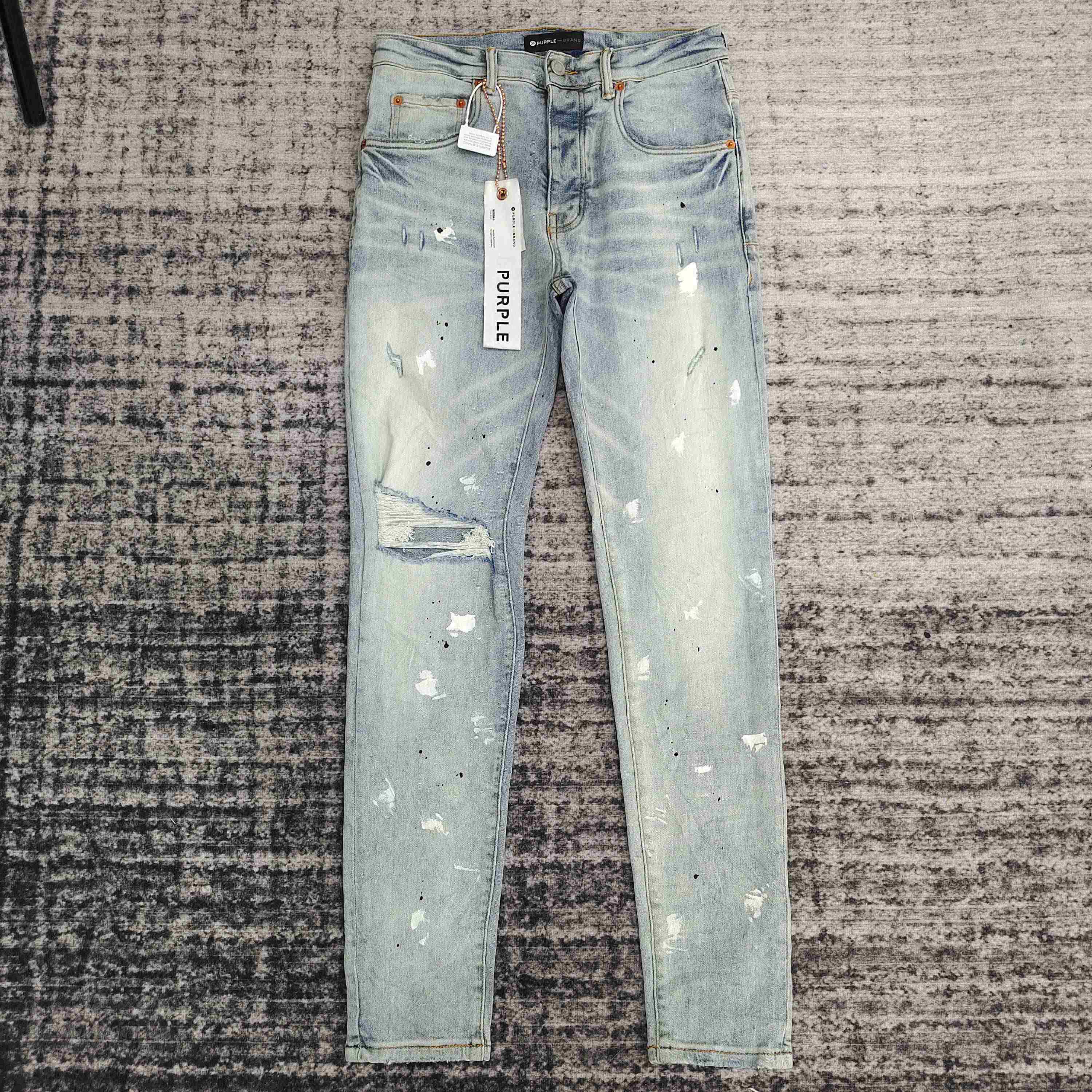 1:1 quality version light blue rubbed white ink washed old ripped jeans