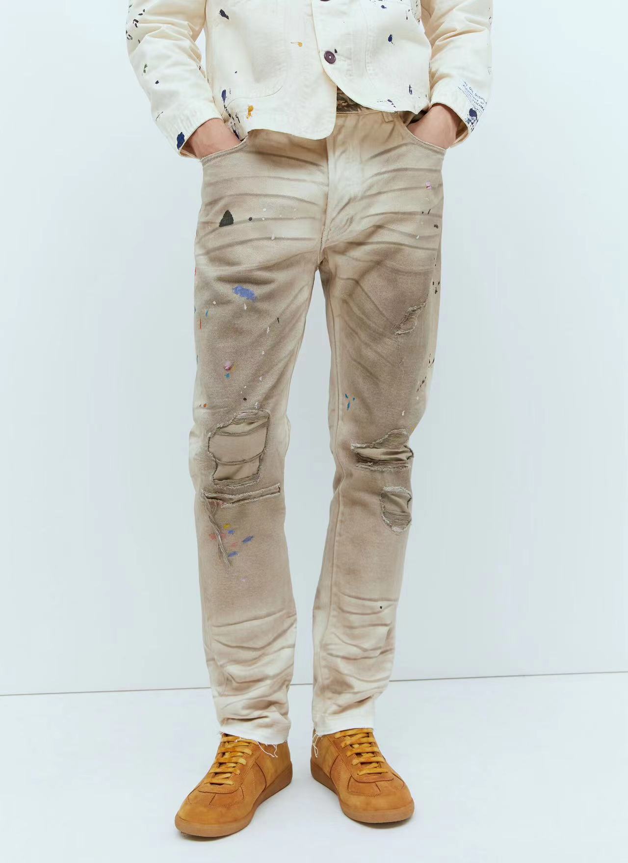 1:1 quality version slashed and frayed dirty hand-painted ink dot jeans