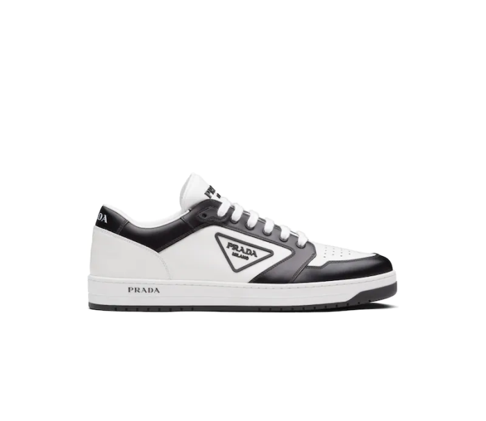 Designer Leather Sneakers High-Top Sneakers Are Accented With Different Interpretations Of The Designer Logo That Appears On The Tongue Along The Light Rubber Sole And As a Rubber Triangle Decorating The Side Of The Ankle