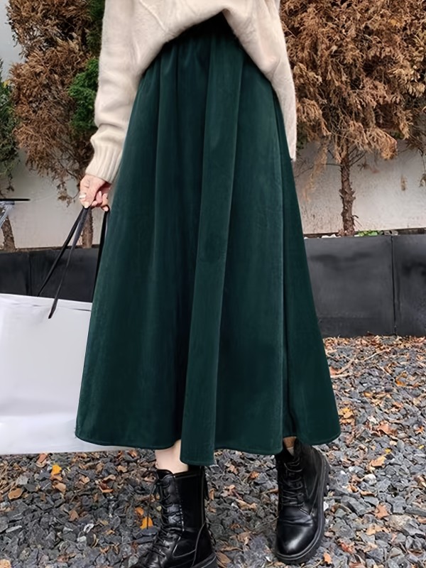 Plus Size Casual Skirt, Women's Plus Solid Elastic High Rise Swing Maxi Skirt With Pockets