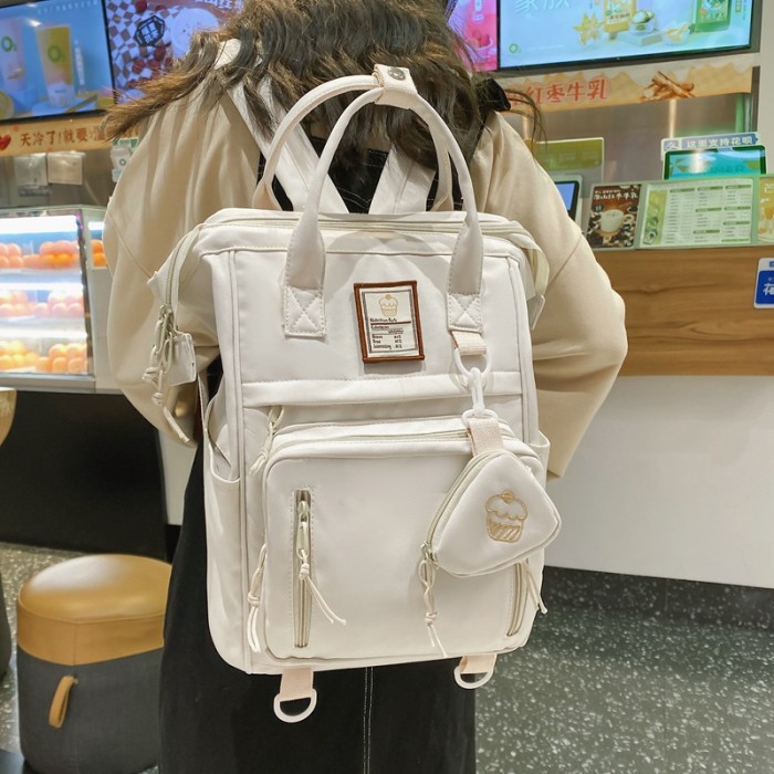 Simple backpack for female college students, campus junior high school, small fresh backpack, large capacity schoolbag