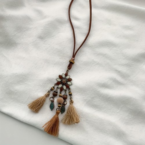 Bohemian Tribal Hand-Woven Pendant Necklace - Fringe Tassel Charm, Hollow Floral Design, Leather Leaf Detail, Rope Chain, No Metal Plating, Versatile for Daily & Vacation Wear - All Season Boho Jewelry
