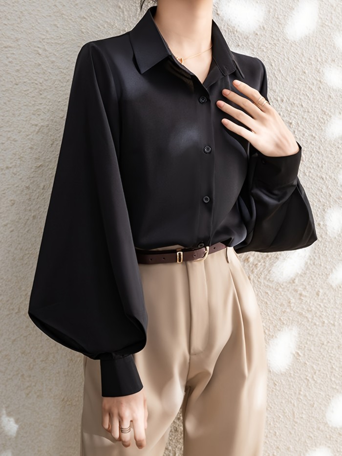 A Stylish Black Shirt For Women, Suitable For Professional And Formal Occasions, Featuring Lantern Sleeves And A Tailored Design For Commuting, New Arrival For Early Spring 2025.