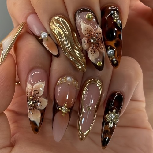 24pcs set of almond-shaped false nails with 3D three-dimensional wave texture and pure desire pearl flowers and sparkling rhinestones suitable for all women and girls. The box comes with nail files and jelly glue for easy application