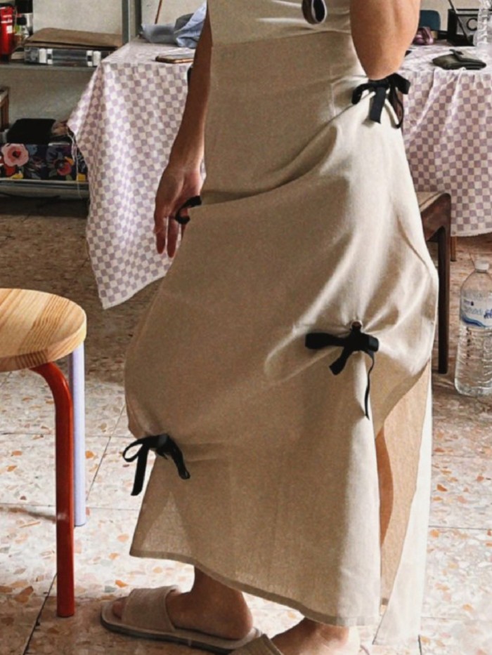 Vintage High-Waisted Solid Color Midi Skirts for Women with Ruched Design And Bow, Featuring a Flowy Style.