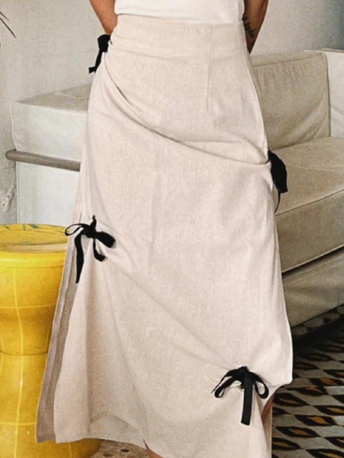 Vintage High-Waisted Solid Color Midi Skirts for Women with Ruched Design And Bow, Featuring a Flowy Style.
