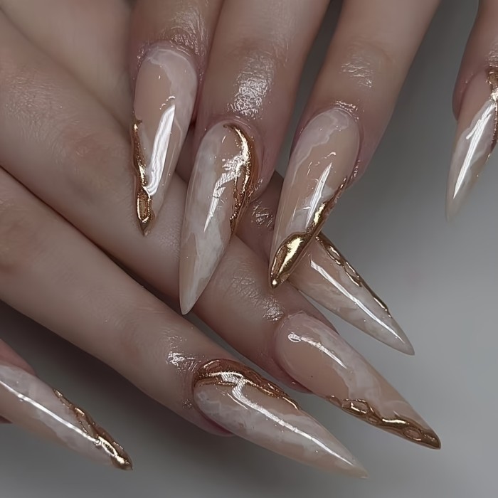 A Set of Ten Handmade Full-Cover Nail Decals for Women, Reusable in a Nude Pointed Shape with a Gradient Metallic Finish.