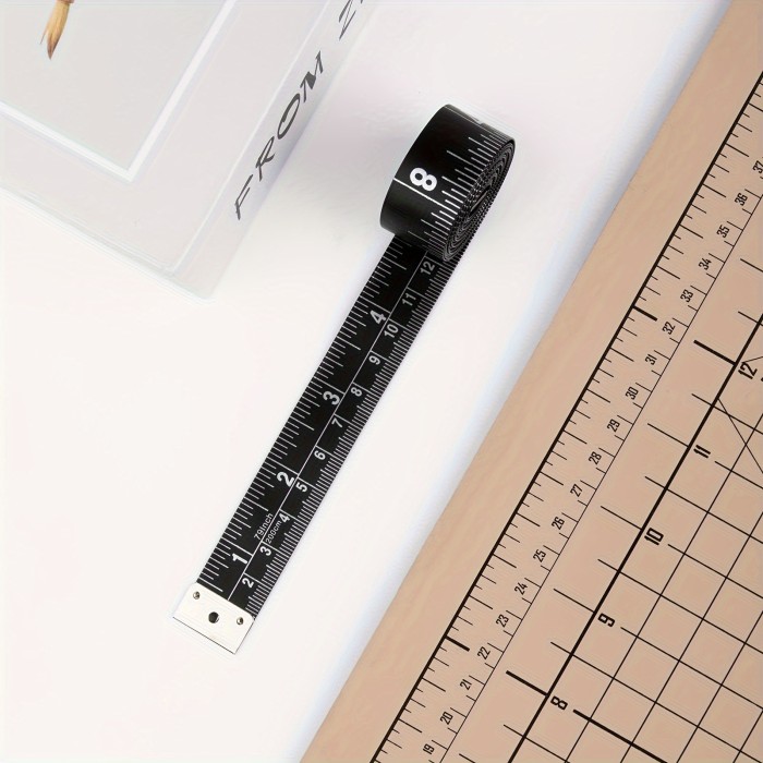 A Black\u002FYellow Measuring Tape Made of PVC Material, Waterproof And Dirt-Resistant, Measuring 200Cm\u002F79 Inches in Length And 2Cm in Width. It Features Exquisite Craftsmanship with Numbers And Is a Double-Sided Tape with Centimeters And Inches. Suitabl