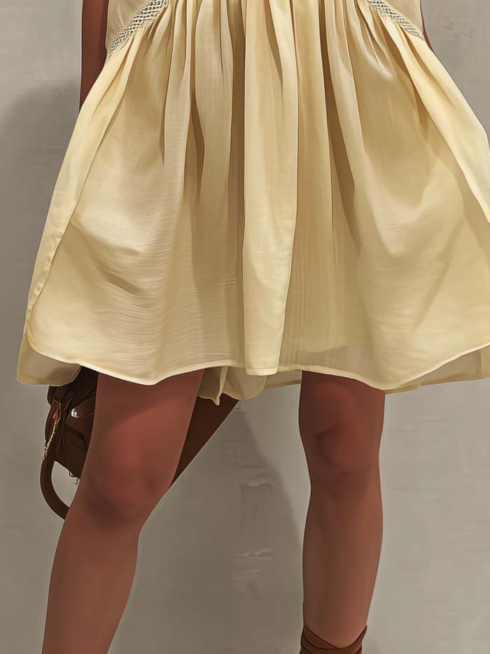 Yellow Sleeveless Mini Dress with Deep V-Neck and Lace Trim