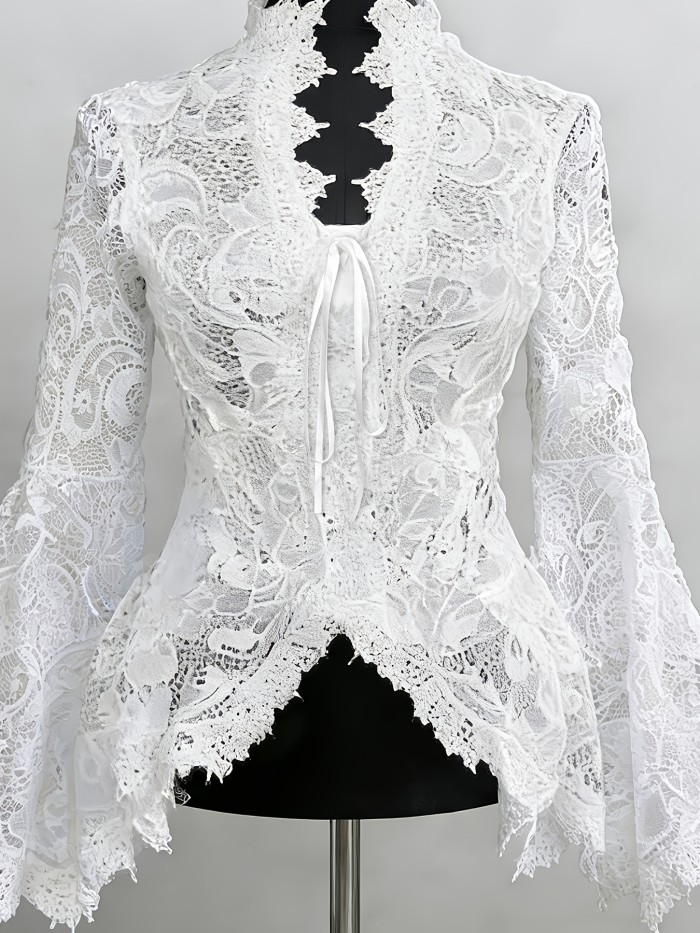 Women's Spring\u002Fsummer Fashion Garment: an Elegant Lace-trimmed, Sheer-bloused Shirt with Ties.