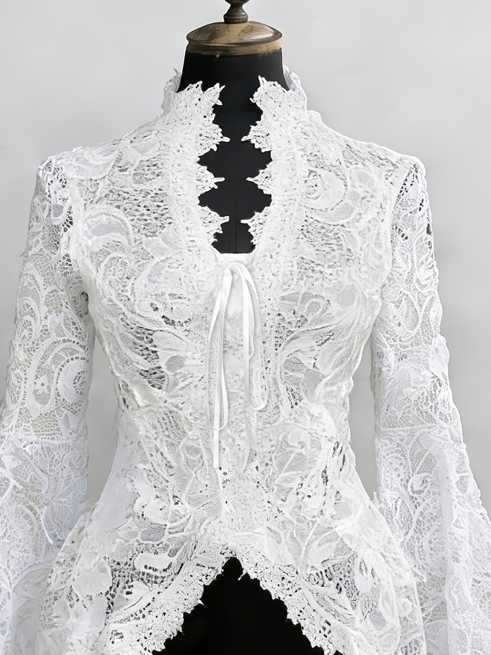 Women's Spring\u002Fsummer Fashion Garment: an Elegant Lace-trimmed, Sheer-bloused Shirt with Ties.